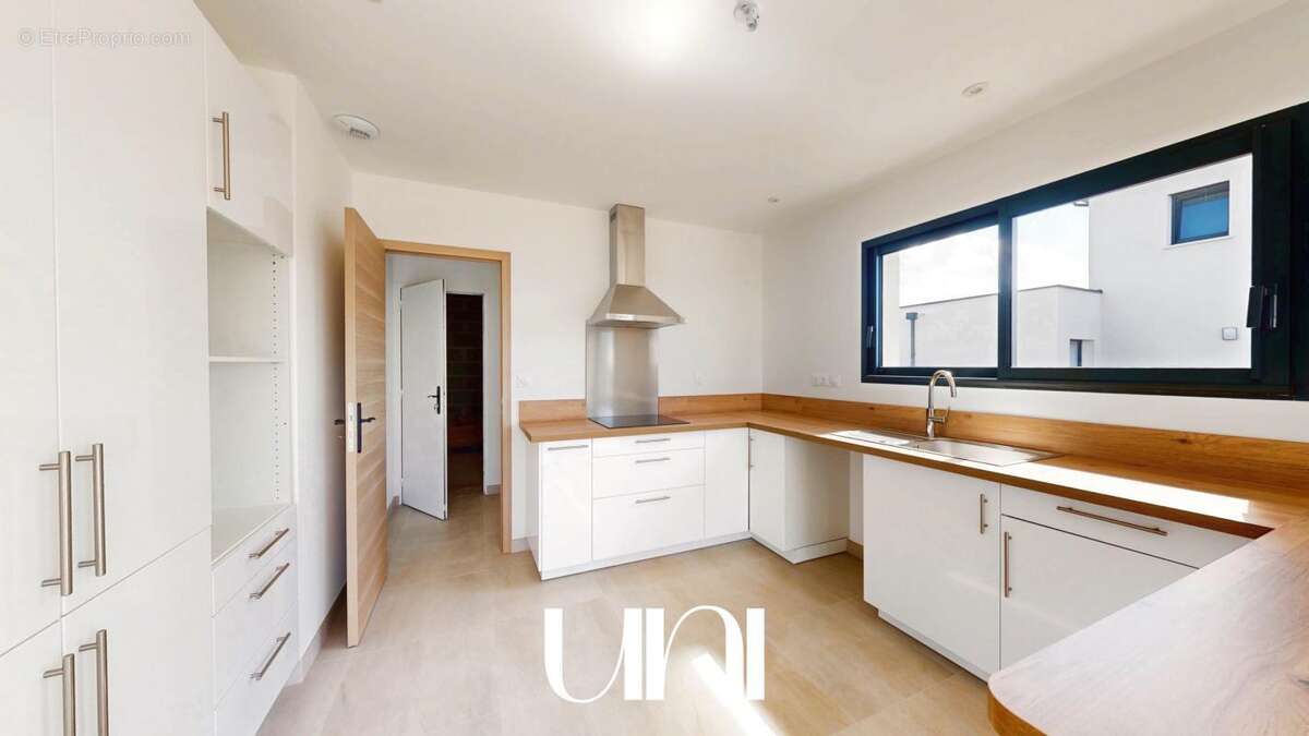 Maison 125 m² à Evrecy  - photo 4