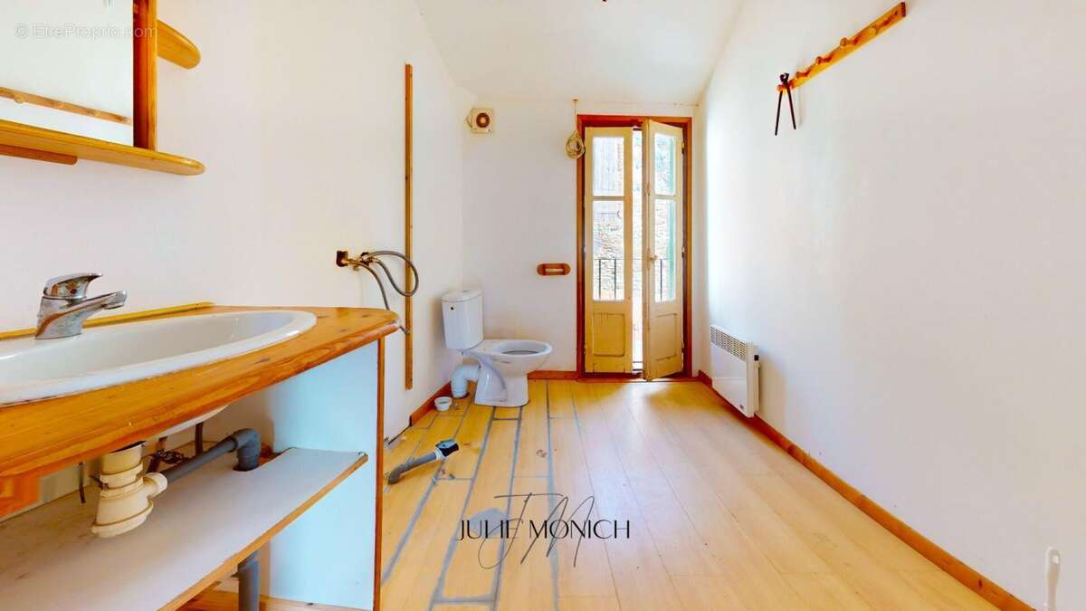Maison de village avec garage - photo 12