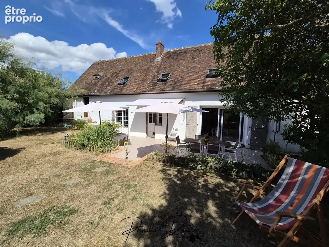 Maison de charme   4 chambres, double garage et terrain de plus de 1 600 m2 - photo 4