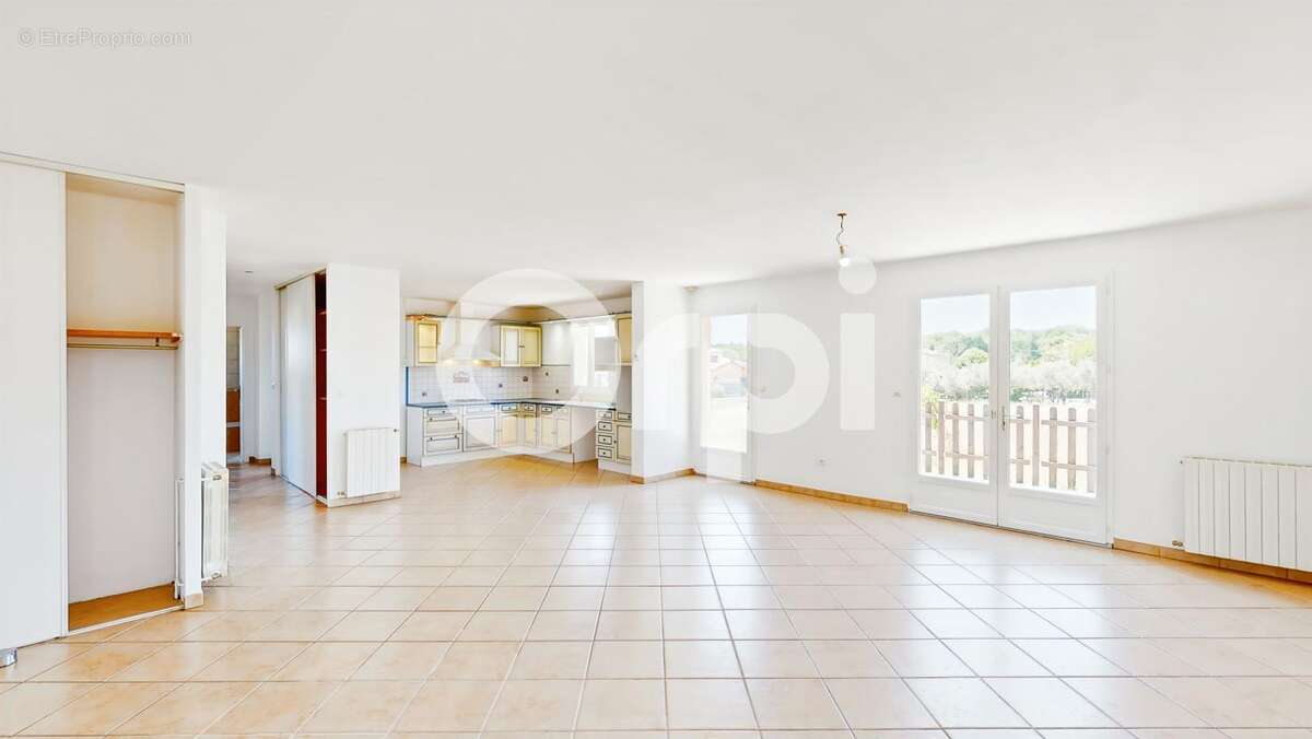 VENTE d'une maison F4 (101,2 m²) à RUOMS sur un terrain de 1125m² - photo 4
