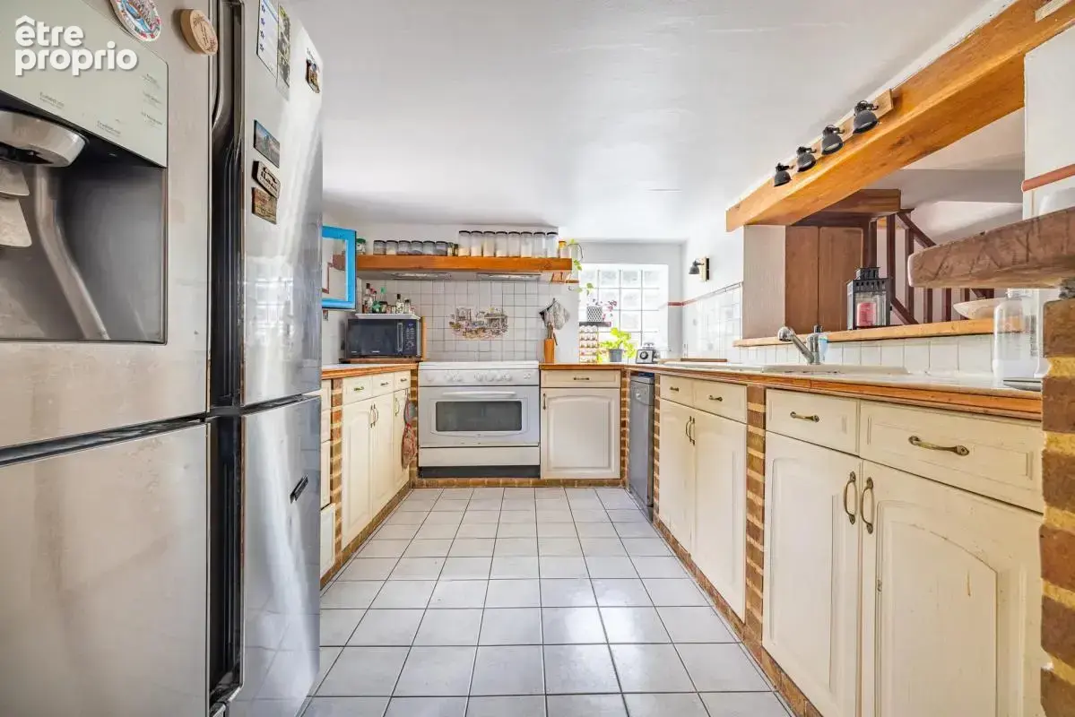 Maison de 7 pièces de 135 m² à Sainte-Geneviève-des-Bois - photo 5