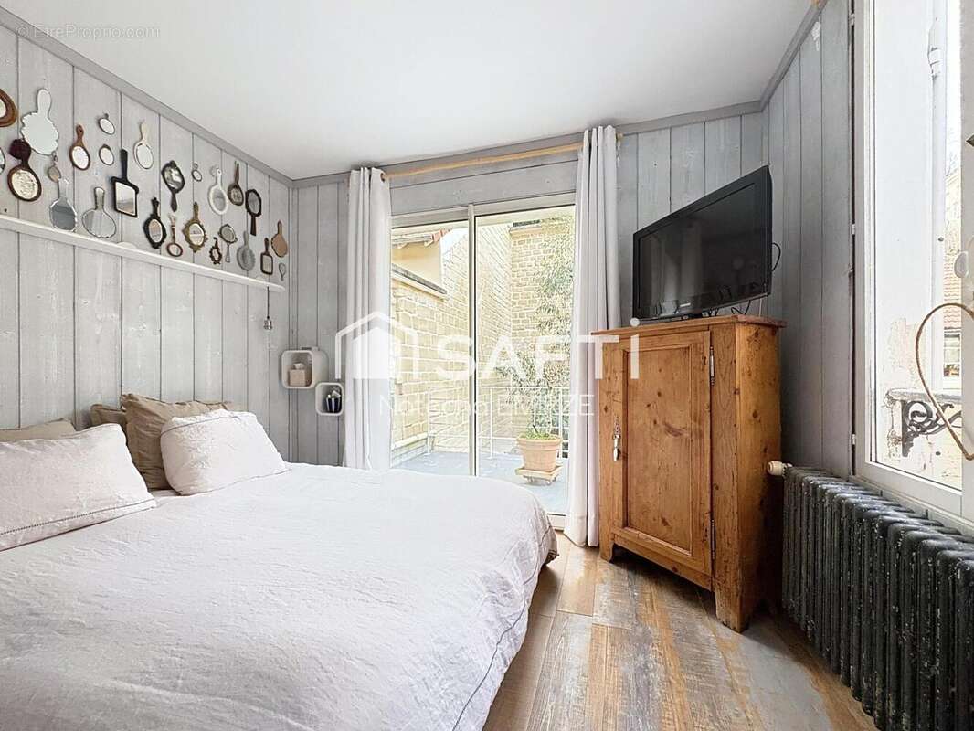 Photo 3 - Maison à LE MESNIL-LE-ROI