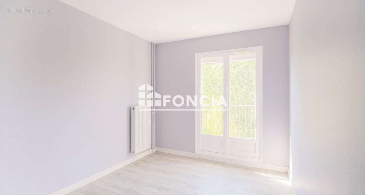 Appartement de 67,3 m2 avec balcon, très bon état, proche commerces et transports - photo 6