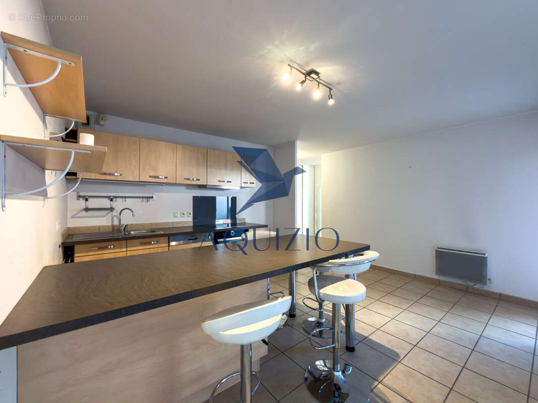 Appartement T3 en rez de jardin avec grande terrasse - photo 2