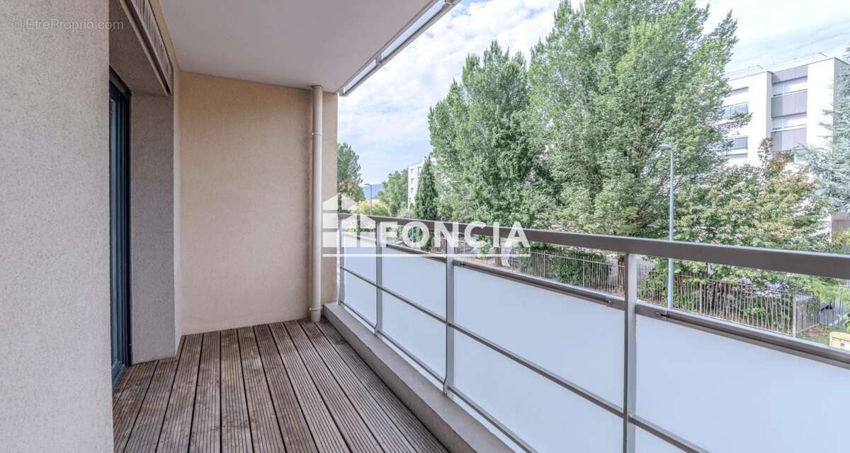 À vendre appartement T4 lumineux avec balcon et garage box – Proche centre de Neuville-sur-Saône - photo 10