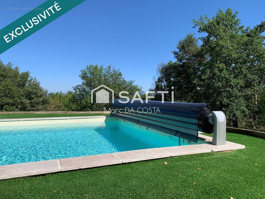 Photo 1 - Maison à ECOTAY-L'OLME