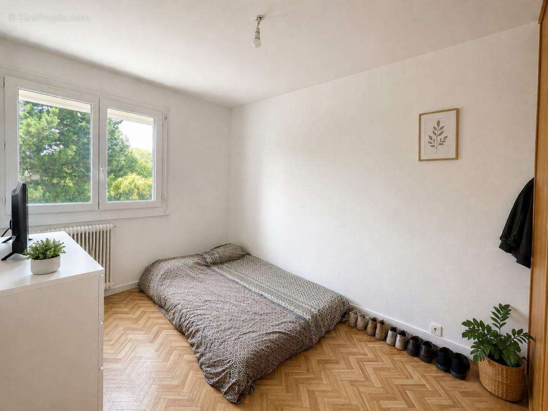 Appartement T3 63,40m2 - 2 chambres - parking et cave - photo 4