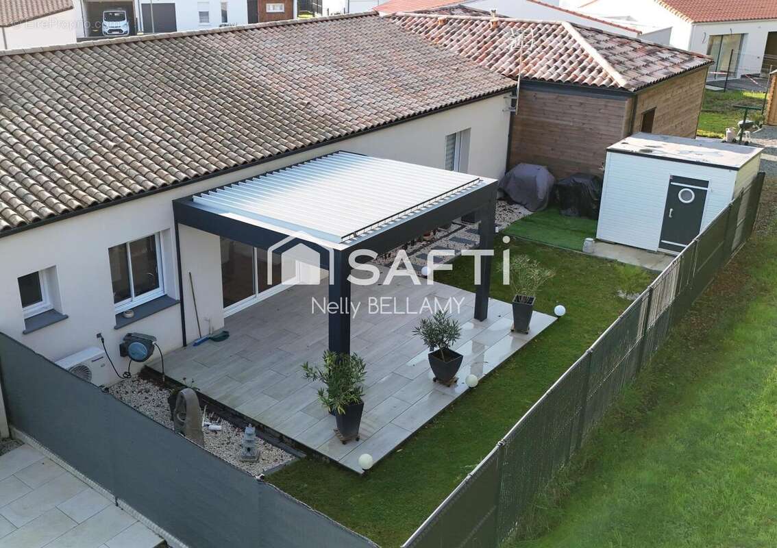 Photo 2 - Maison à SAINT-JULIEN-DES-LANDES