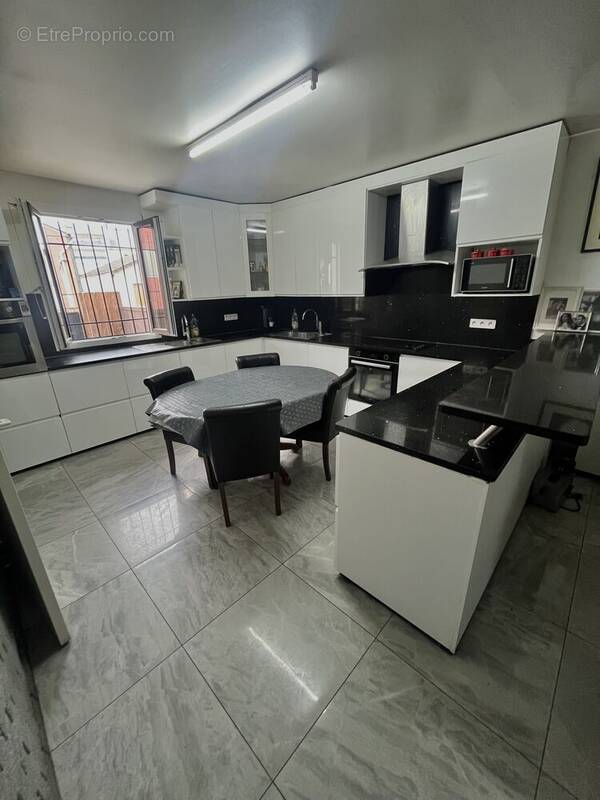 Photo 1 - Maison à AUBERVILLIERS