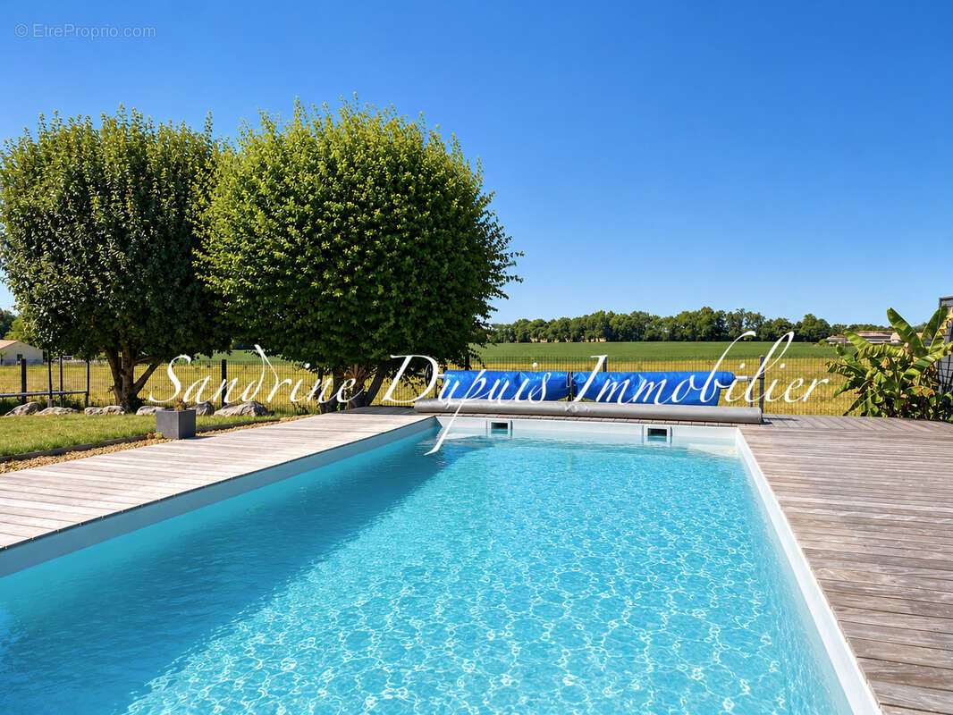Plain-pied de 118 m2   4 chambres   Piscine chauffée - photo 2