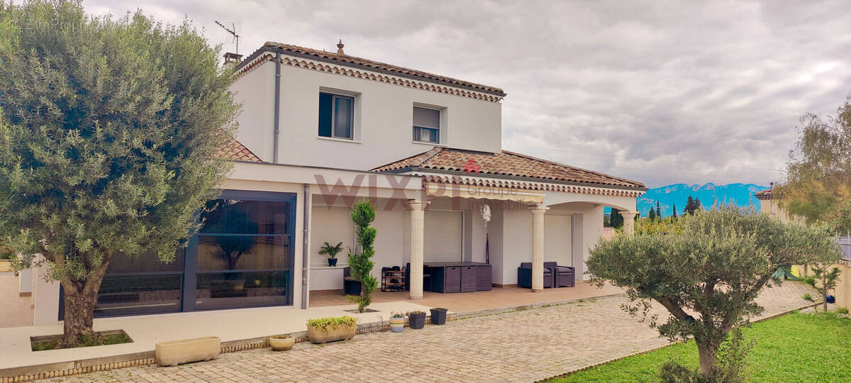 Maison à ROMANS-SUR-ISERE