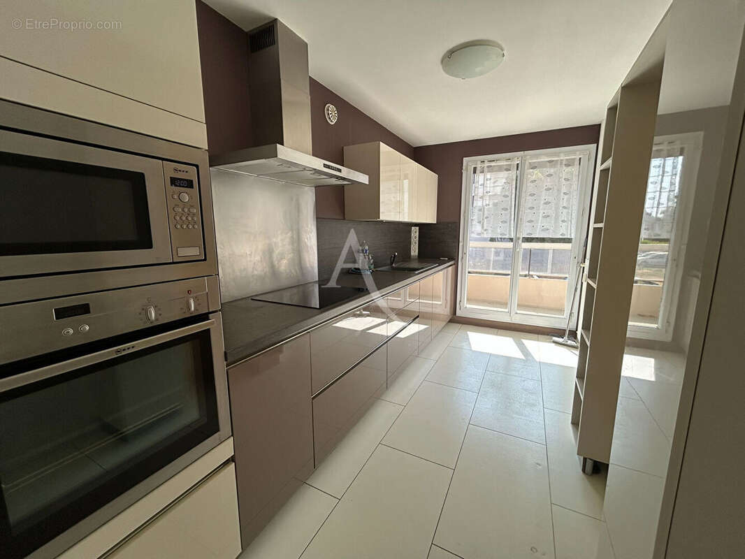 Appartement de 92 m² proche front de mer - photo 4