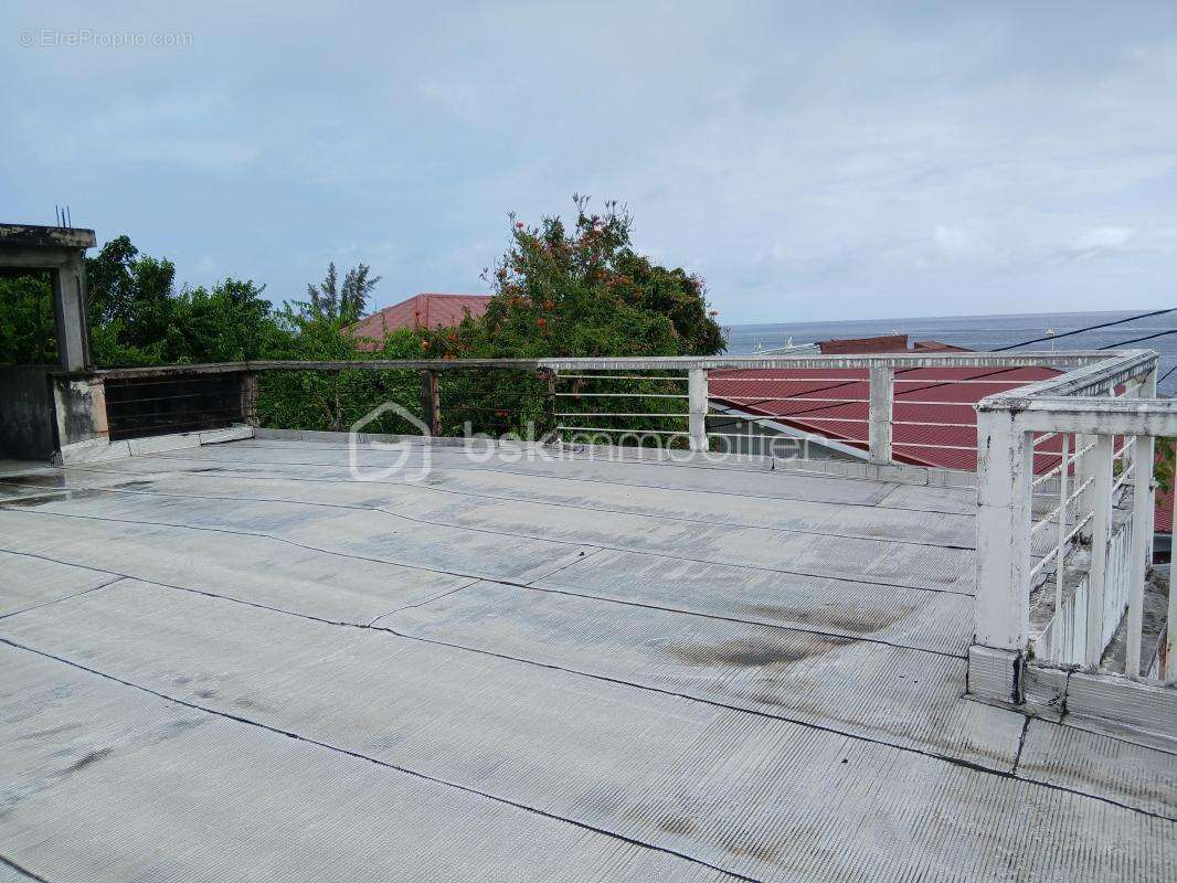 Immeuble d’exception au cœur de Basse-Terre avec rooftop et vue mer - photo 10