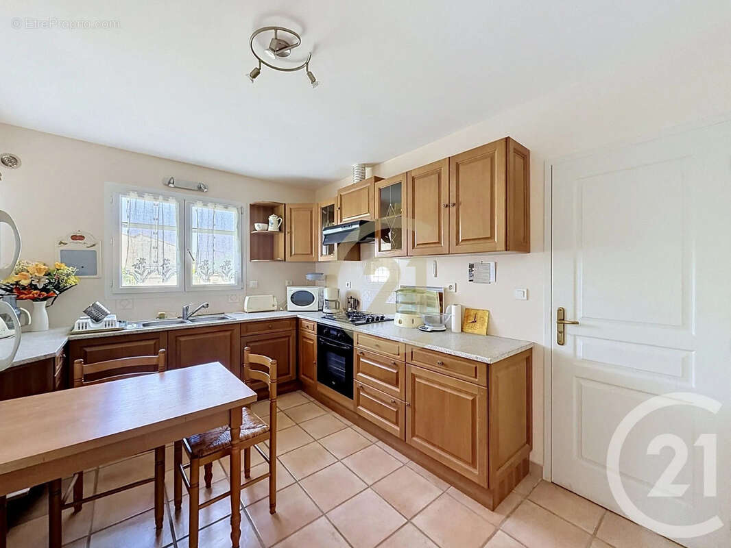 Maison 87 m² à Aramon  - photo 6