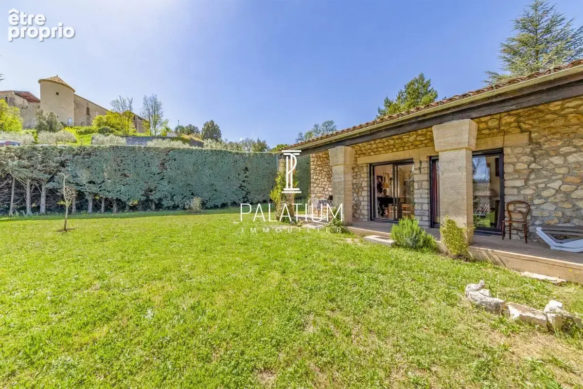 Maison de plain-pied avec jardin arboré et 3 appartements - photo 12