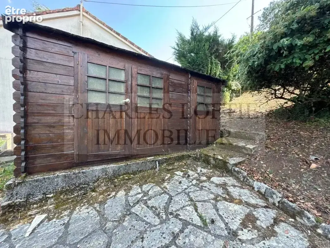 Maison familiale spacieuse avec grand terrain et garage - photo 14