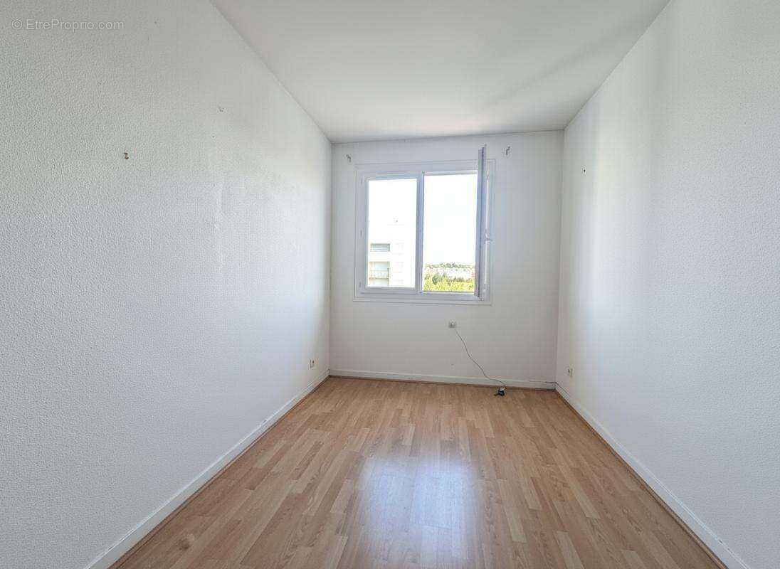 Appartement lumineux de 88 m² avec balcon, ascenseur et vue dégagée - photo 8