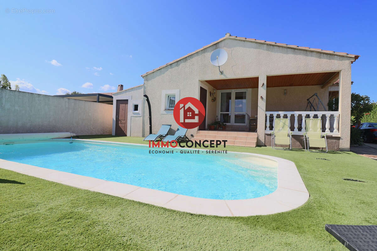 Maison à LAUDUN-L'ARDOISE