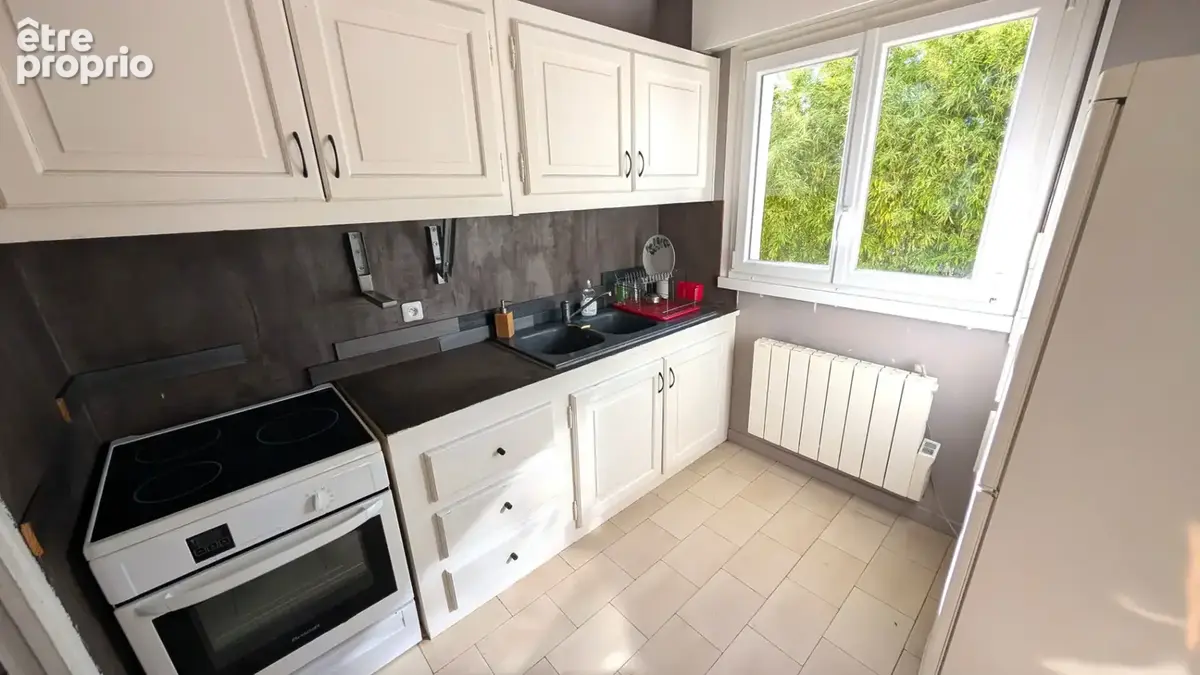 Agréable appartement T2 au calme très proche  centre ville avec parking - photo 4