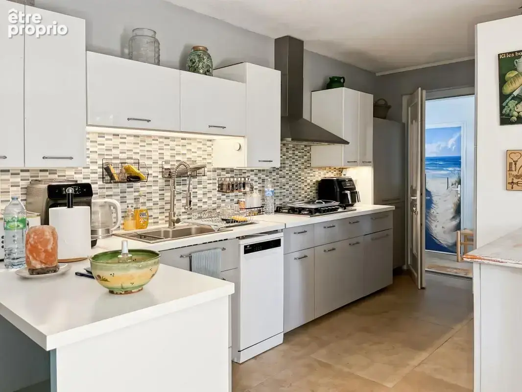 Vente appartement à Marseillan en rez-de-jardin avec garage et piscine - photo 12