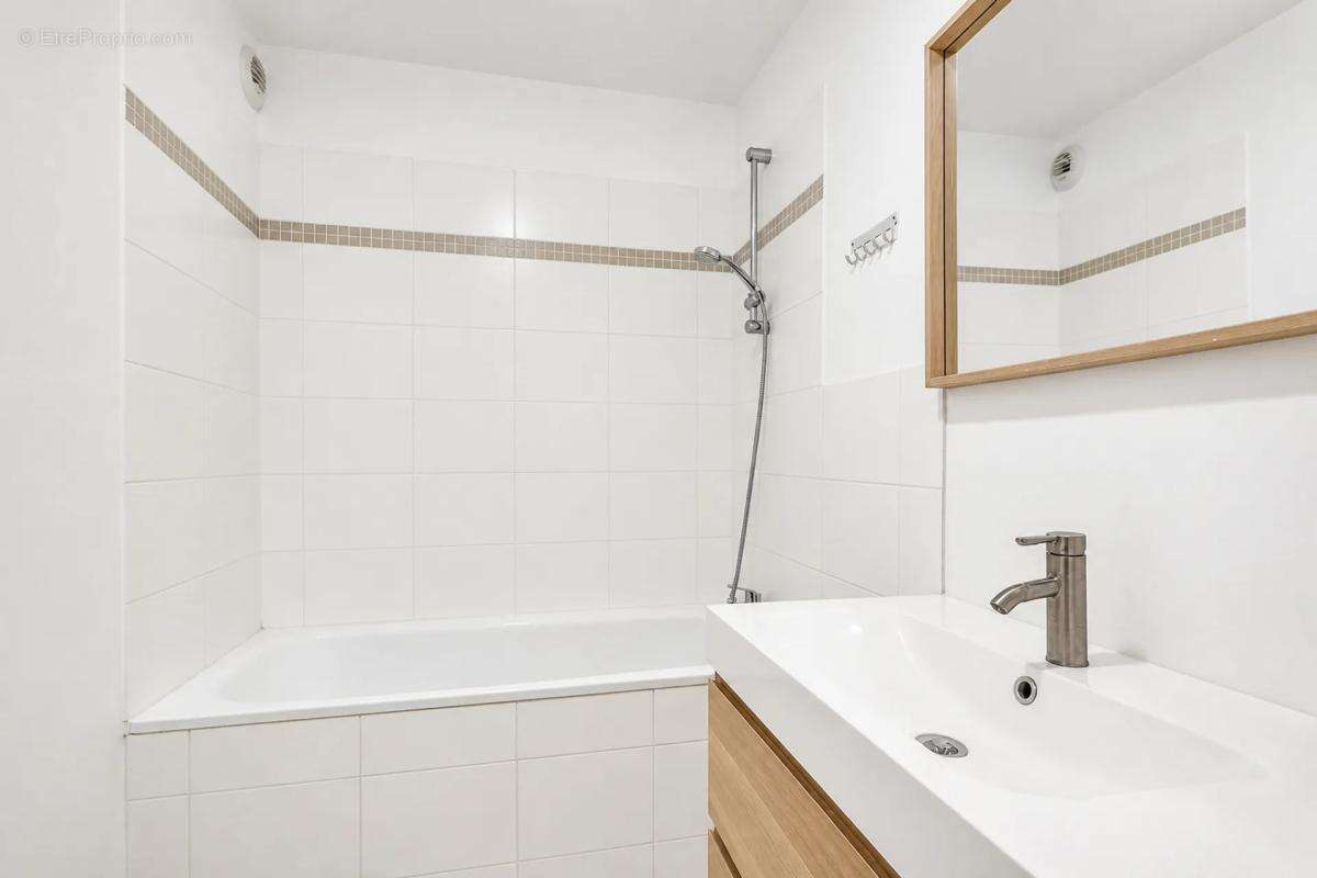 Maison de 5 pièces de 100 m² - photo 10