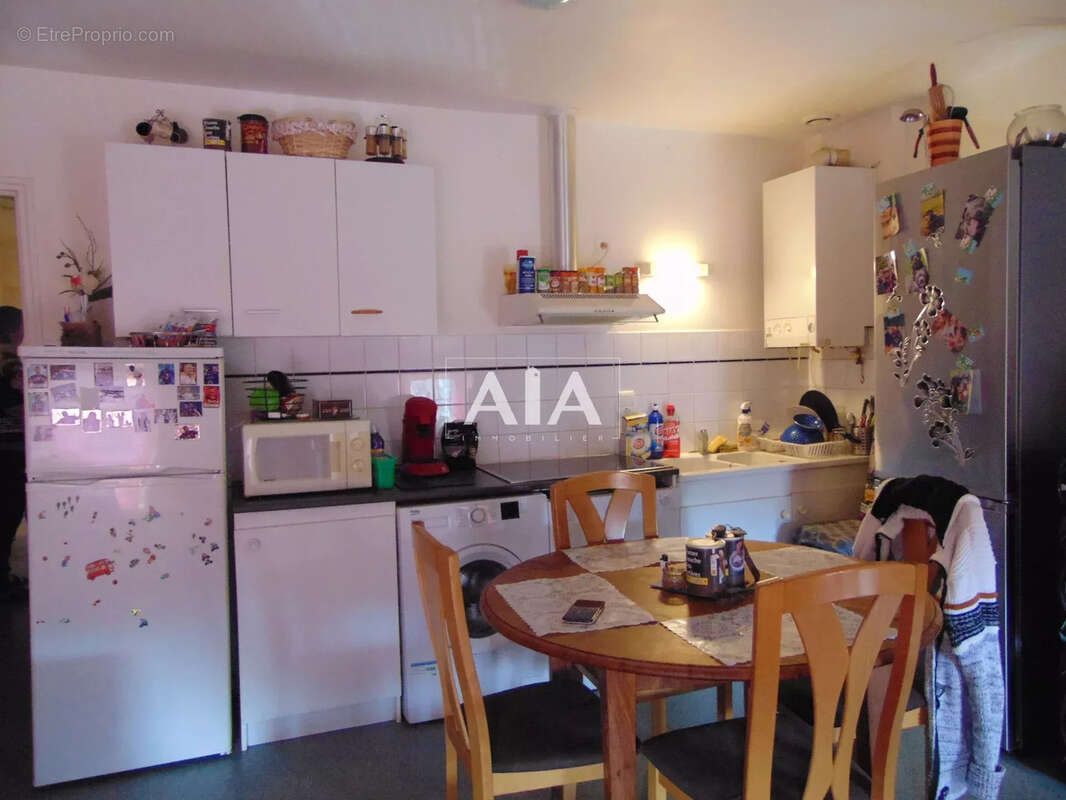Immeuble appartements + commerce - photo 6