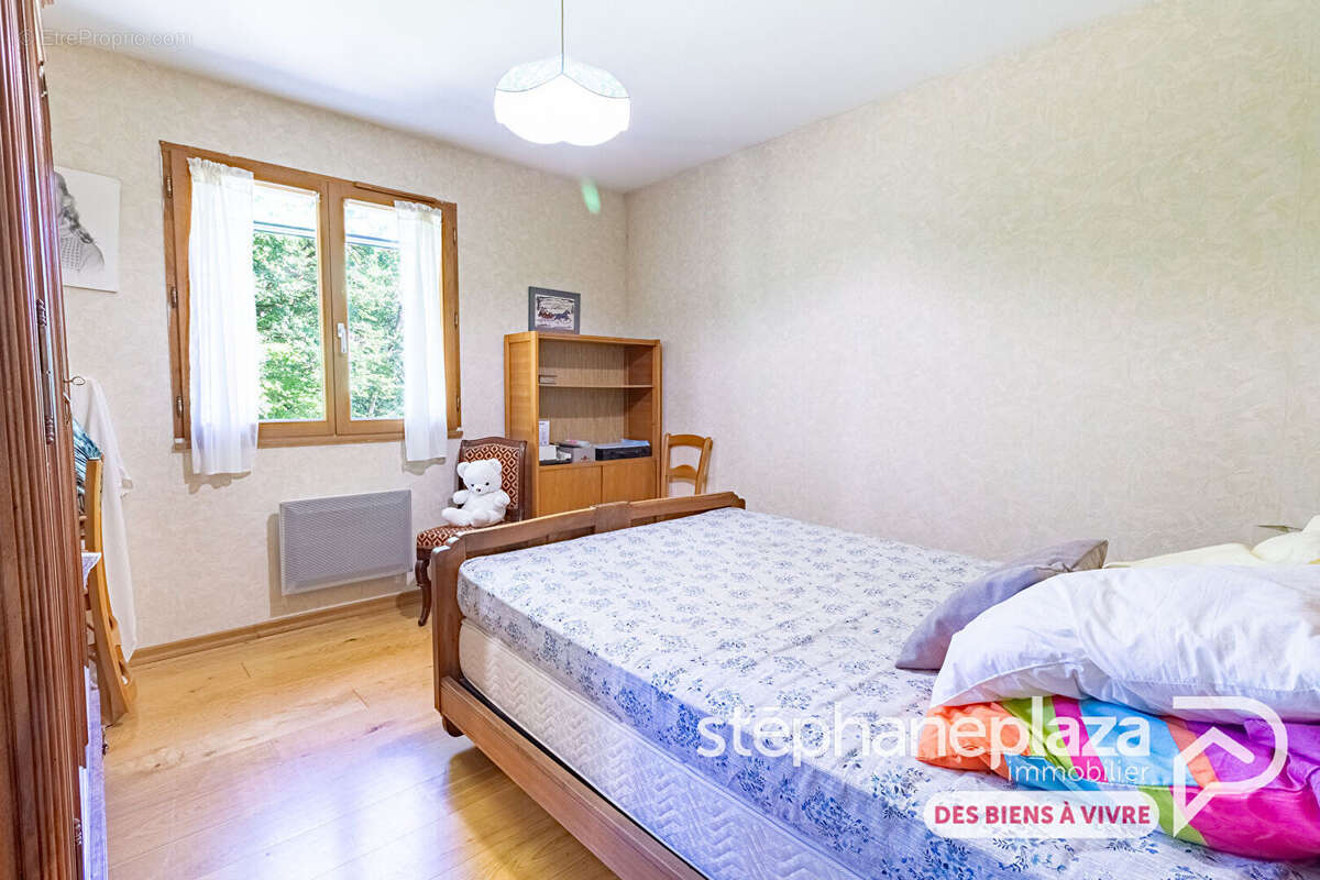 Maison familiale 4 chambres avec parc arboré de 2 500 m² - photo 11