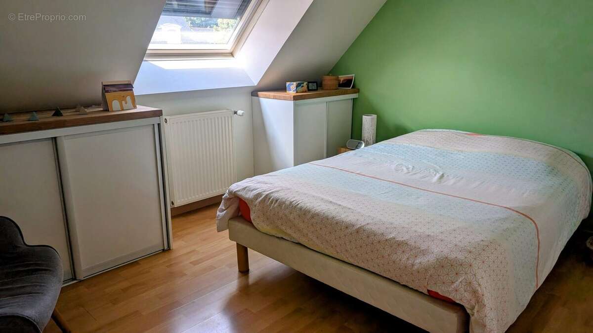 Maison 116 m² à Saint-Jean-De-Linieres  - photo 9