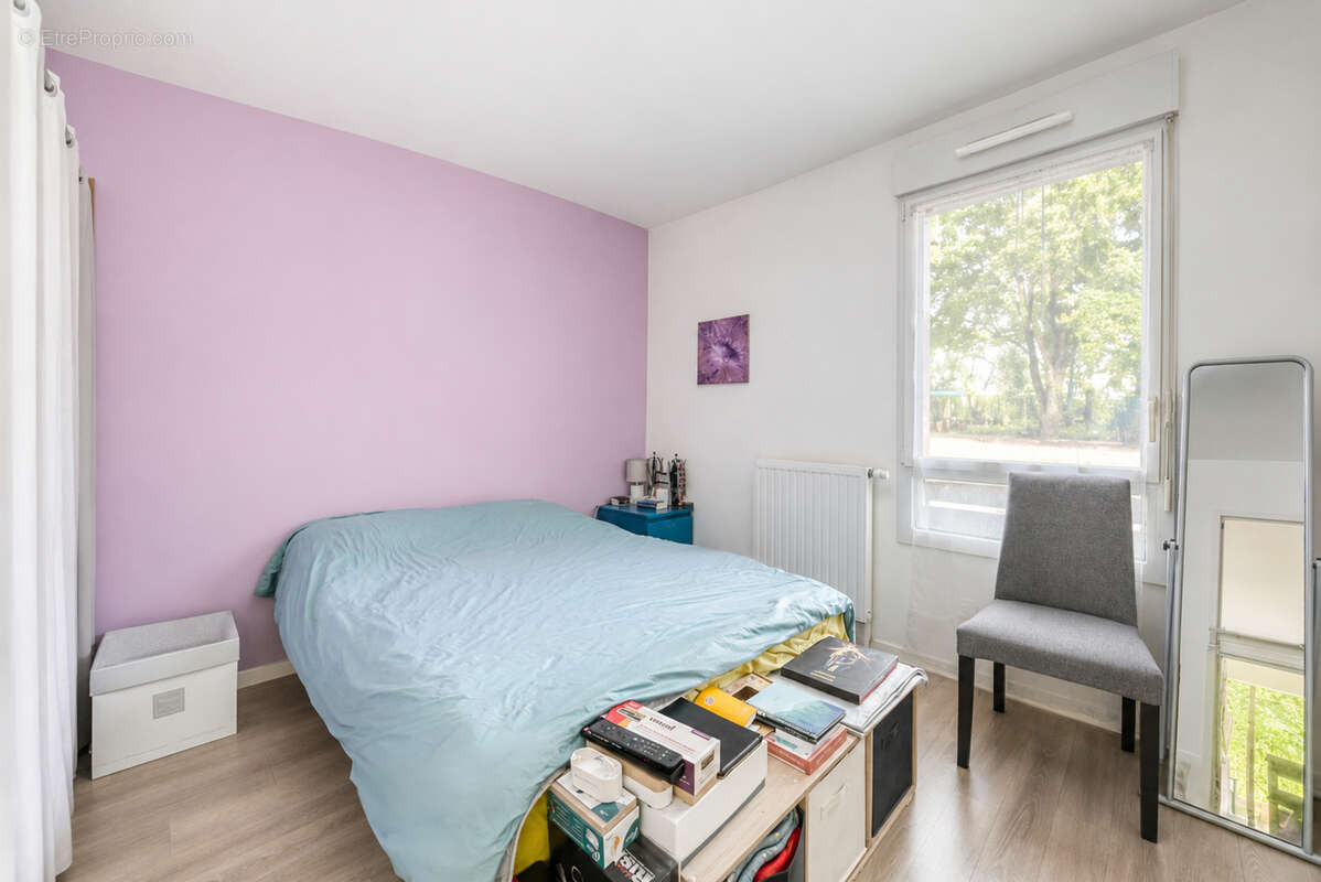 Appartement T4 - Longs Champs - photo 5