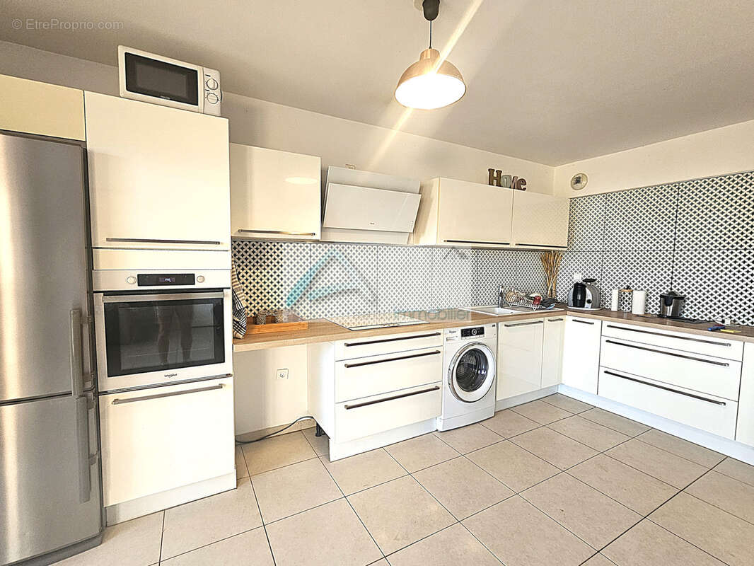 Appartement F4 avec grande terrasse - photo 3