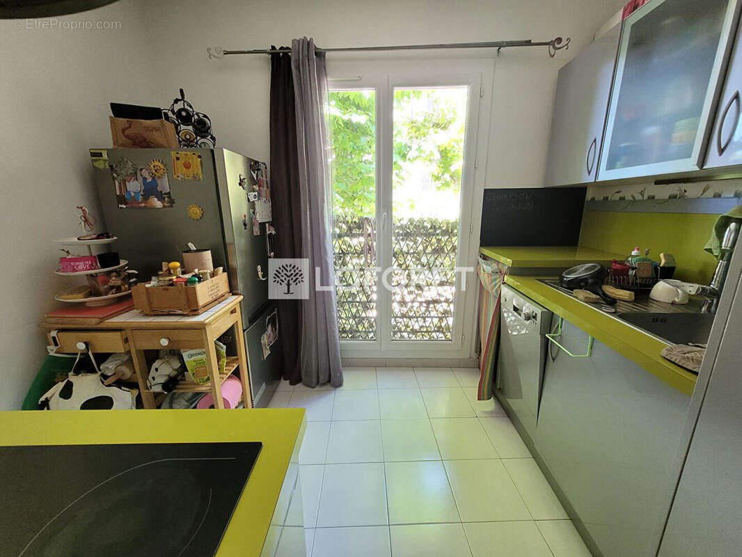 Appartement T3 avec terrasse - photo 4