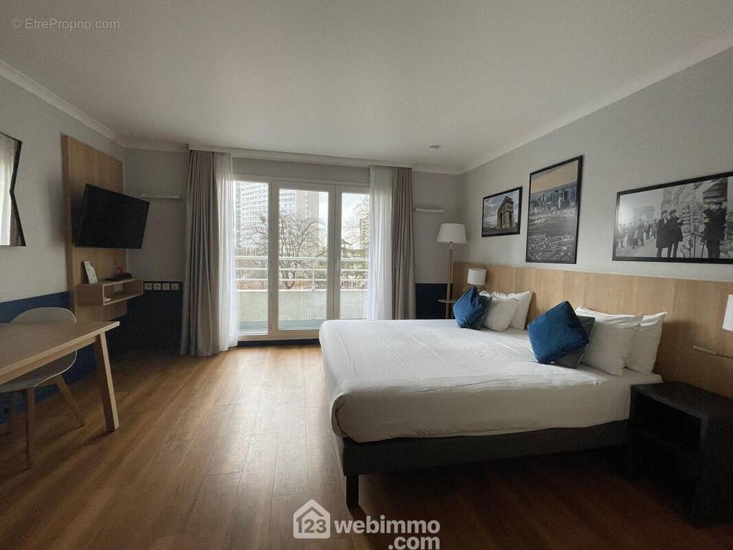 Photo 1 - Appartement à COURBEVOIE