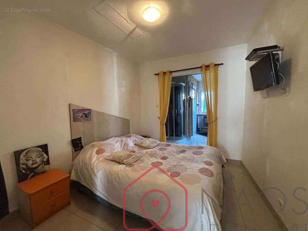 Au cur de la ville, cette maison de 67,31 m², - photo 3