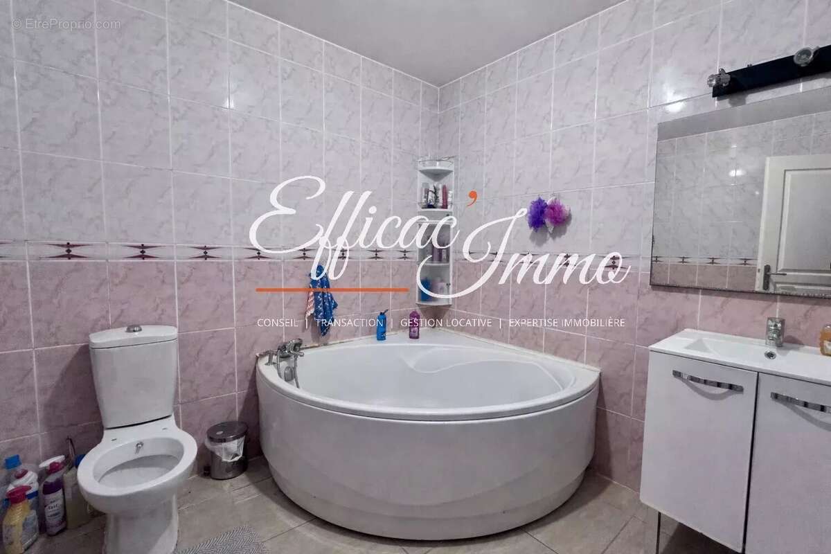 Appartement t4 de 97,06 m² – balcon – box privatif - photo 12