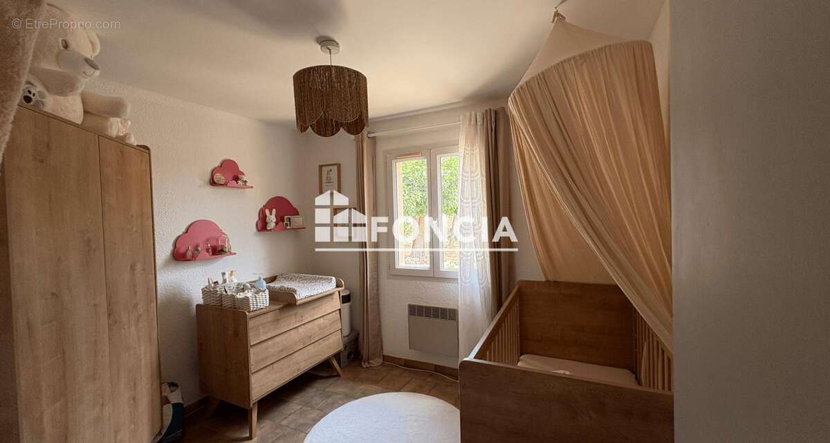 Maison T4 de 87 m2 de plain pied à Collorgues - photo 3