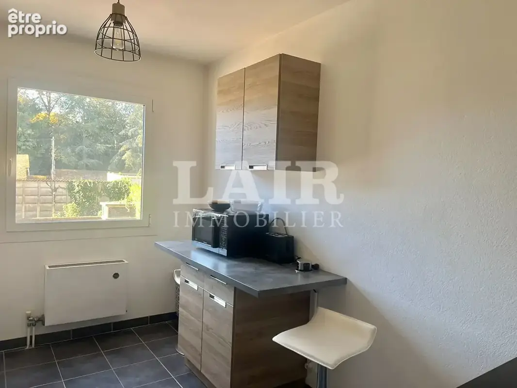 Appartement T2 avec balcon, cave et parking privatif - Ref 15733 - photo 6