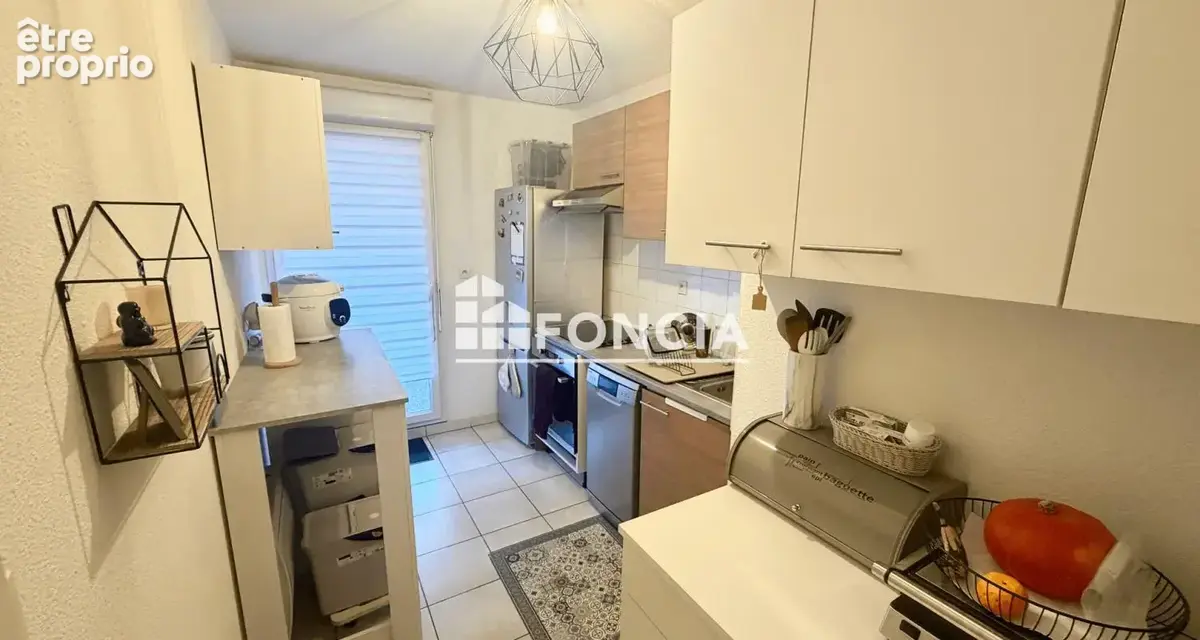 T3 de 61m2 en rez de jardin, avec terrasse et parking vendu libre d'occupation - photo 2