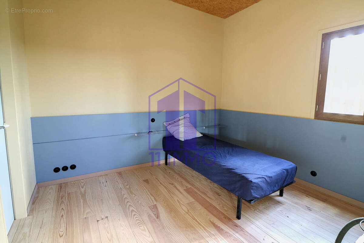 Chambre 1 (EST) - Maison à VELIEUX