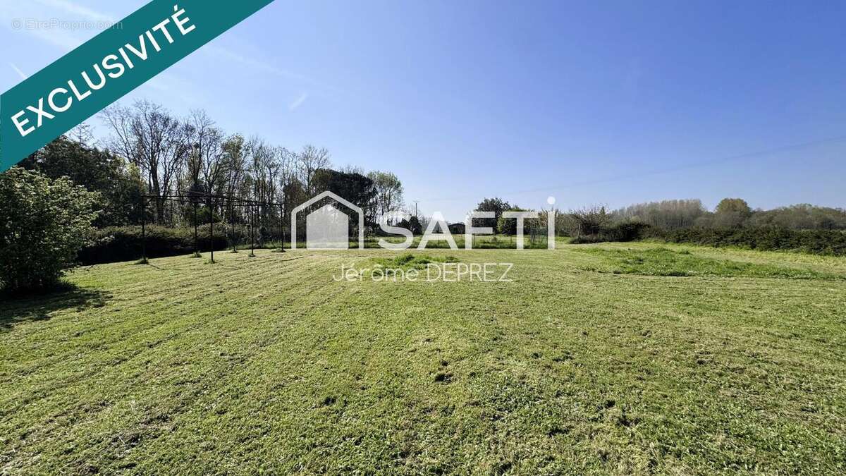 Photo 3 - Terrain à LES MAGNILS-REIGNIERS