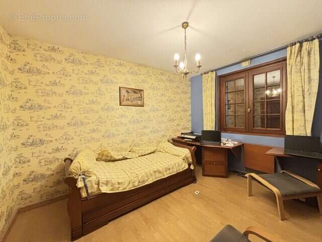 Maison 86 m² à Saint-Genest-Lerpt  - photo 9