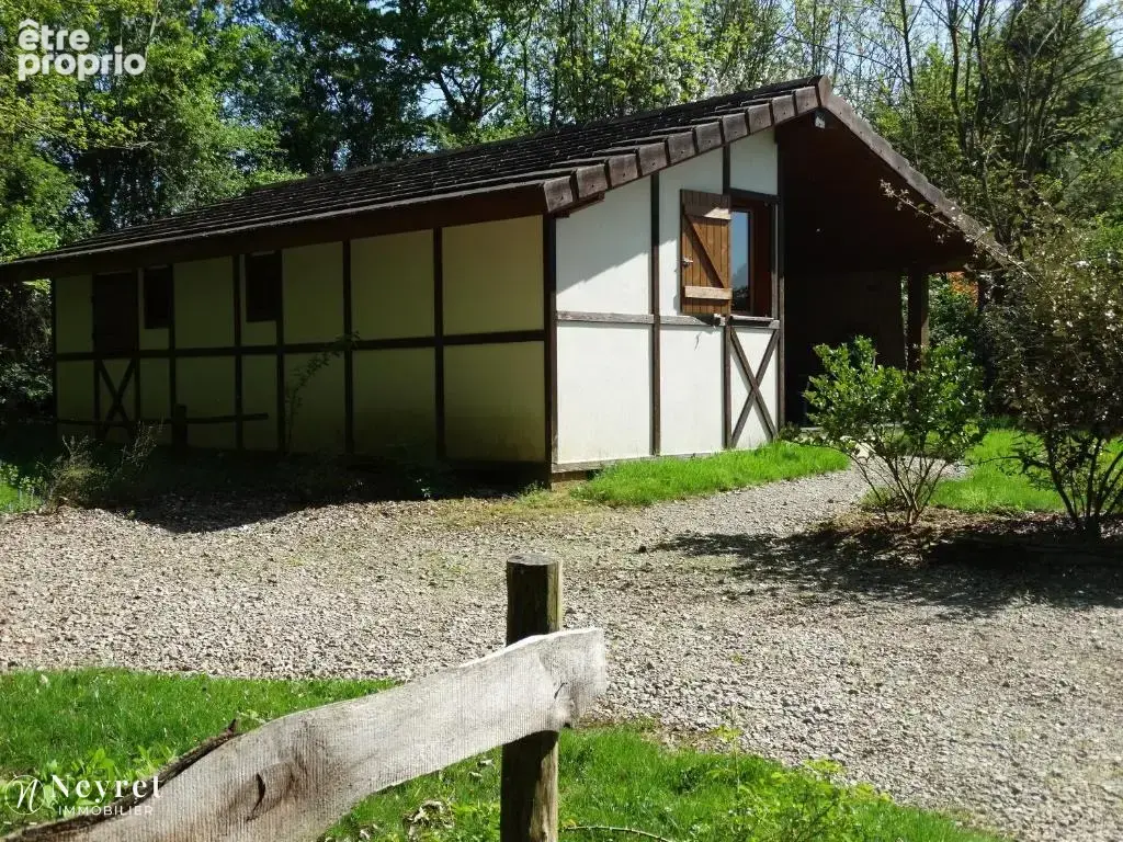 Propriété composée de cinq chalets et deux étangs - photo 2