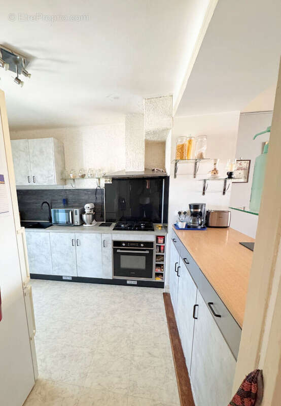 SAINT CYPRIEN VILLAGE - IMMEUBLE  - 235 m²  - Deux appartements F4 et local commercial -  Jardins et Garages - photo 16