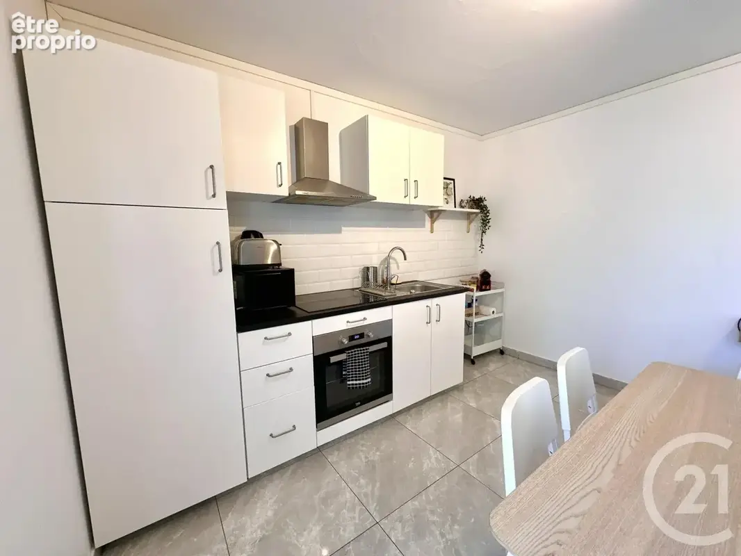 Appartement 4 pièces 65 m² à vendre à Reims (51100) - photo 5