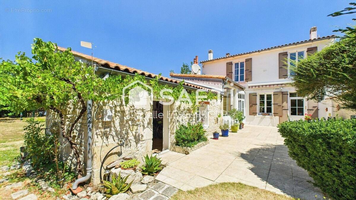 Photo 1 - Maison à AIGREFEUILLE-D'AUNIS