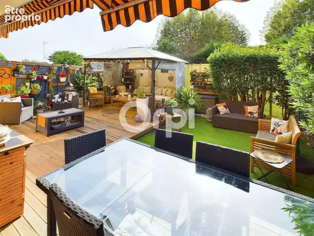 Jardin au coeur de la ville - plein sud - cave - rare - photo 9