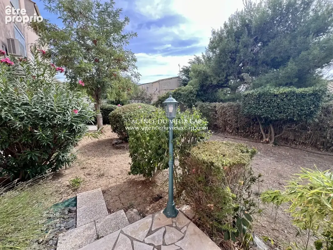 Achat cap d'agde secteur vieux port / falaises spacieux t3 en rdc vue jardin avec parking prive - photo 18