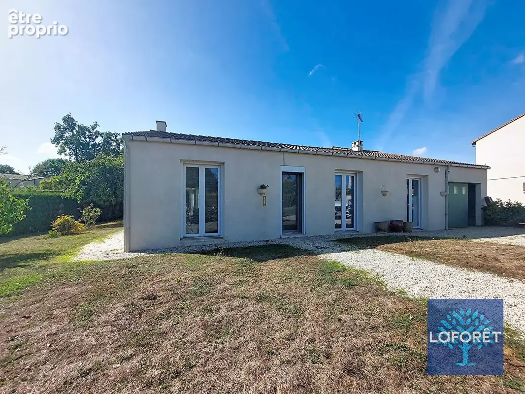 Maison de plain-pied idéalement située avec garage - photo 14