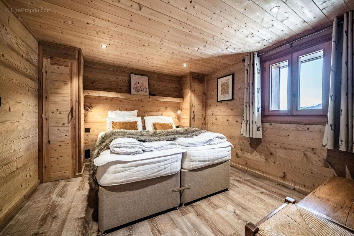 Un chalet alpin magnifiquement aménagé offrant une vue panoramique, idéalement situé à Chavannes - photo 17