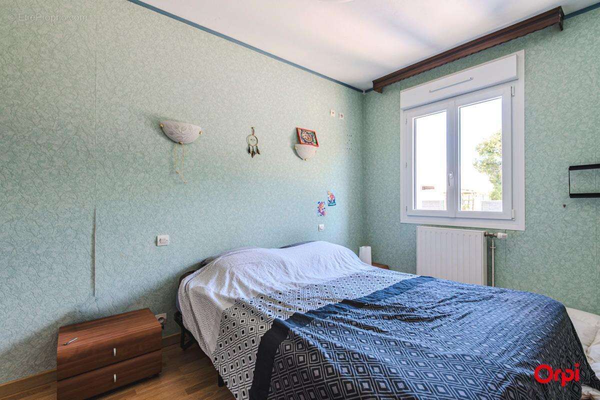 Maison de Plain Pied à Vendre avec Jardin, terrasse et Garage en sous-sol - photo 5
