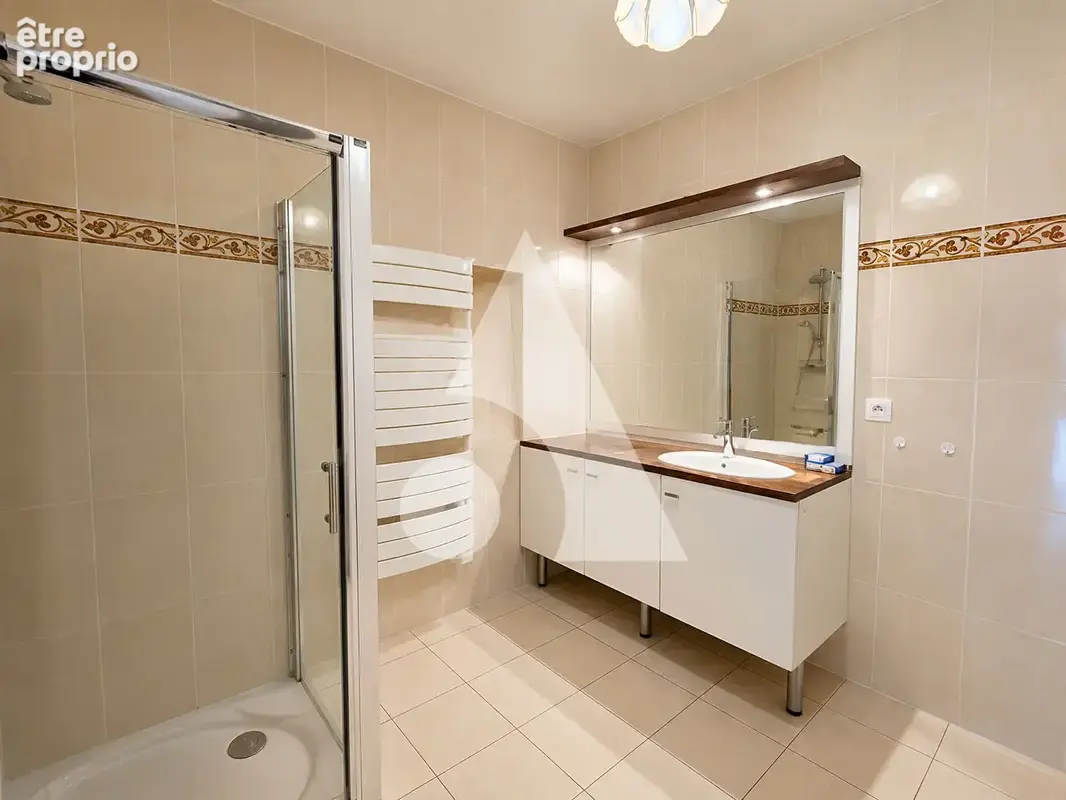 Appartement SAINTE GENEVIEVE DES 3 pièces 79.35m² - photo 7